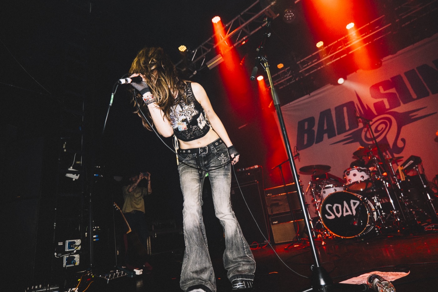 Tally Spear live — red stage lights